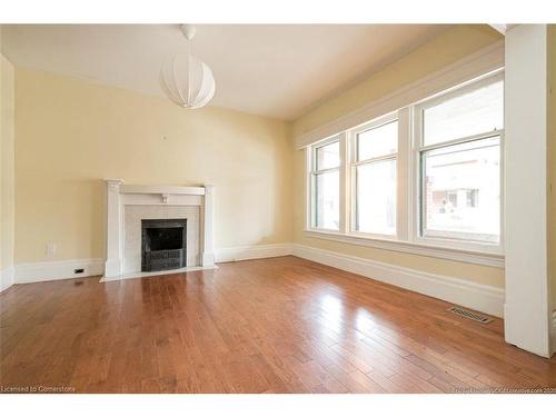 31 St Clair Avenue, Hamilton, ON - Indoor Photo Showing Living Room With Fireplace