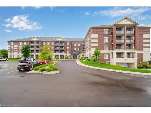 115-308 Watson Parkway N, Guelph, ON - Outdoor With Balcony With Facade