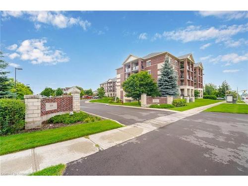 115-308 Watson Parkway N, Guelph, ON - Outdoor With Facade