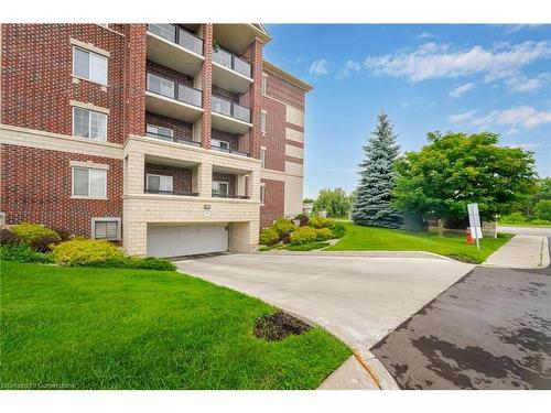 115-308 Watson Parkway N, Guelph, ON - Outdoor With Balcony With Facade