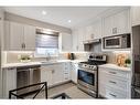 106-2301 Cavendish Drive, Burlington, ON  - Indoor Photo Showing Kitchen With Stainless Steel Kitchen With Upgraded Kitchen 