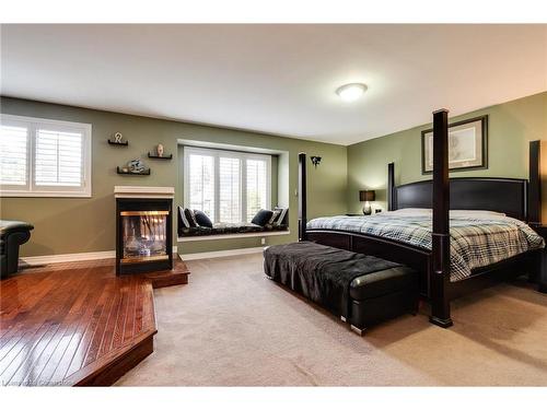 151 Moorland Crescent, Ancaster, ON - Indoor Photo Showing Bedroom With Fireplace