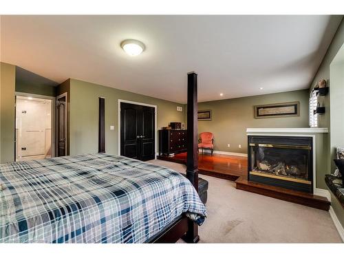 151 Moorland Crescent, Ancaster, ON - Indoor Photo Showing Bedroom With Fireplace