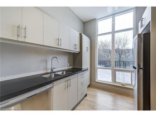 601-2750 King Street E, Hamilton, ON - Indoor Photo Showing Kitchen With Double Sink