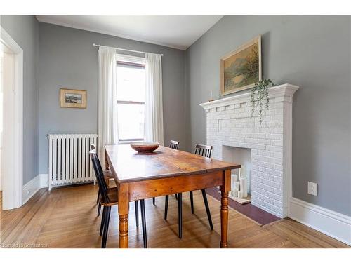 234 East Avenue N, Hamilton, ON - Indoor Photo Showing Dining Room With Fireplace