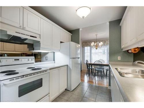 12-1275 Maple Crossing Boulevard, Burlington, ON - Indoor Photo Showing Kitchen With Double Sink