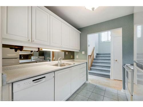 12-1275 Maple Crossing Boulevard, Burlington, ON - Indoor Photo Showing Kitchen With Double Sink