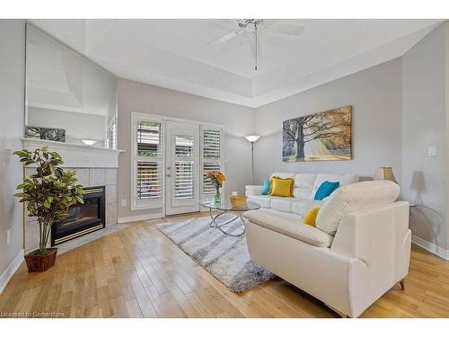 95 Starfish Drive, Mount Hope, ON - Indoor Photo Showing Living Room With Fireplace