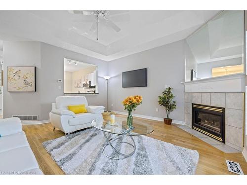 95 Starfish Drive, Mount Hope, ON - Indoor Photo Showing Living Room With Fireplace