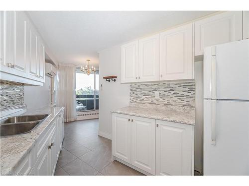 703-335 Mill Road, Etobicoke, ON - Indoor Photo Showing Kitchen With Double Sink