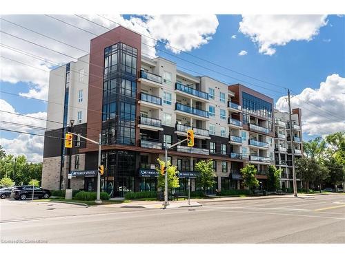 211-320 Plains Road E, Burlington, ON - Outdoor With Balcony With Facade