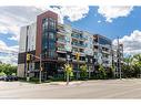 211-320 Plains Road E, Burlington, ON  - Outdoor With Balcony With Facade 