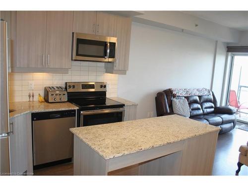 304-560 North Service Road, Grimsby, ON - Indoor Photo Showing Kitchen With Stainless Steel Kitchen