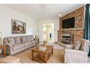 2486 Snowhill Court, Burlington, ON  - Indoor Photo Showing Living Room With Fireplace 