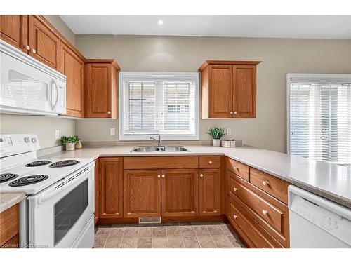 17-1041 Pine Street, Dunnville, ON - Indoor Photo Showing Kitchen With Double Sink