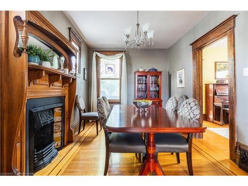 77 Mountain Avenue, Hamilton, ON - Indoor Photo Showing Dining Room With Fireplace