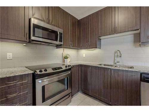 216-33 Whitmer Street, Milton, ON - Indoor Photo Showing Kitchen With Double Sink With Upgraded Kitchen