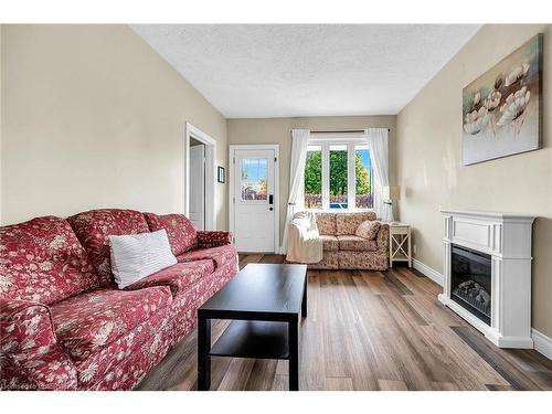 74 East 18Th Street, Hamilton, ON - Indoor Photo Showing Living Room With Fireplace