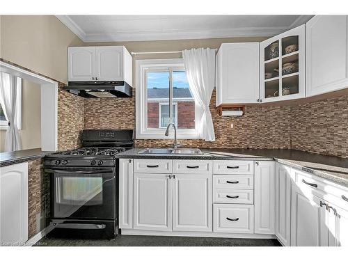 74 East 18Th Street, Hamilton, ON - Indoor Photo Showing Kitchen With Double Sink