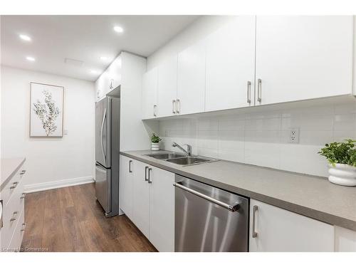 212-45 Southport Street, Toronto, ON - Indoor Photo Showing Kitchen With Double Sink