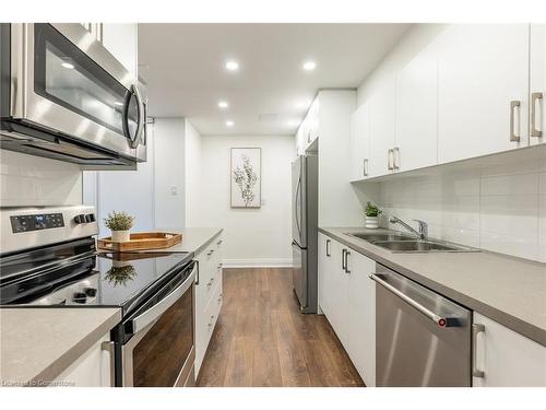 212-45 Southport Street, Toronto, ON - Indoor Photo Showing Kitchen With Double Sink