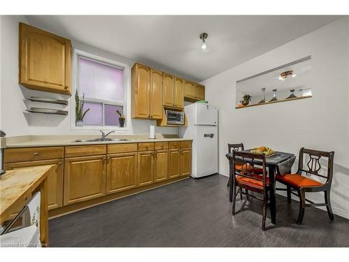 19 Railway Street, Hamilton, ON - Indoor Photo Showing Kitchen With Double Sink