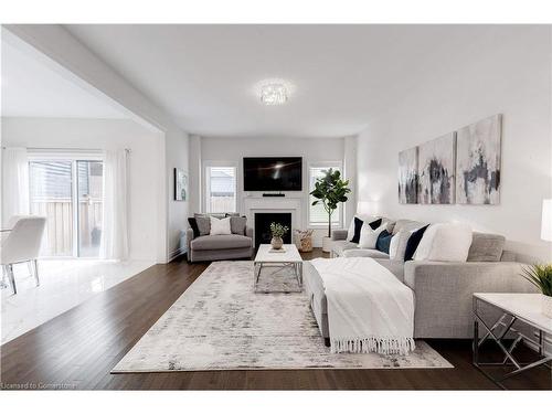 278 Fasken Court, Milton, ON - Indoor Photo Showing Living Room With Fireplace