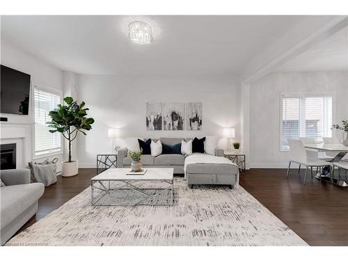 278 Fasken Court, Milton, ON - Indoor Photo Showing Living Room With Fireplace