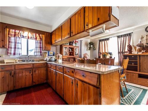 1295 Cannon Street E, Hamilton, ON - Indoor Photo Showing Kitchen With Double Sink