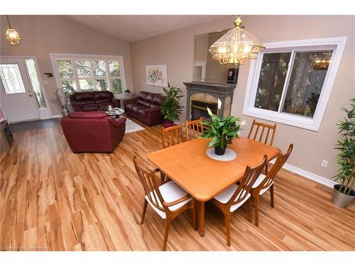 282 Winterberry Drive, Stoney Creek, ON - Indoor Photo Showing Dining Room With Fireplace