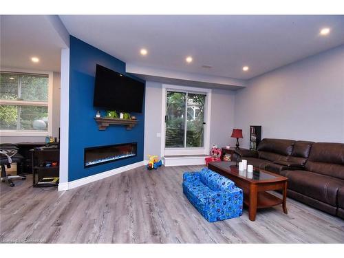 282 Winterberry Drive, Stoney Creek, ON - Indoor Photo Showing Living Room With Fireplace