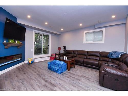 282 Winterberry Drive, Stoney Creek, ON - Indoor Photo Showing Living Room With Fireplace