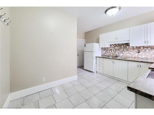 114 Tisdale Street N, Hamilton, ON - Indoor Photo Showing Kitchen With Double Sink