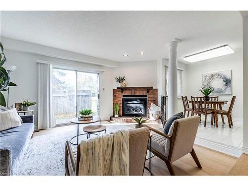 56-3050 Orleans Road, Mississauga, ON - Indoor Photo Showing Living Room With Fireplace