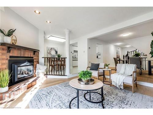 56-3050 Orleans Road, Mississauga, ON - Indoor Photo Showing Living Room With Fireplace