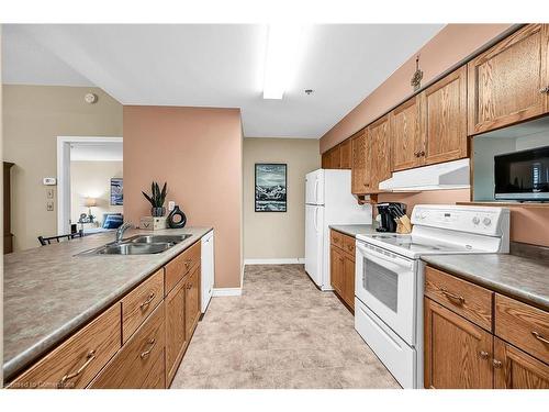 212-317 Lock Street W, Dunnville, ON - Indoor Photo Showing Kitchen With Double Sink