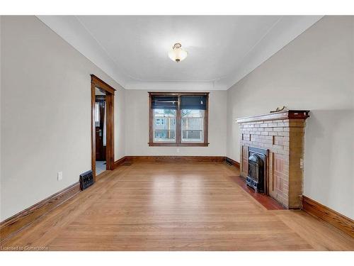 982 King Street E, Hamilton, ON - Indoor Photo Showing Other Room With Fireplace