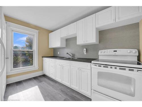 982 King Street E, Hamilton, ON - Indoor Photo Showing Kitchen With Double Sink