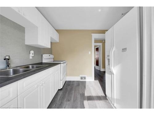 982 King Street E, Hamilton, ON - Indoor Photo Showing Kitchen With Double Sink