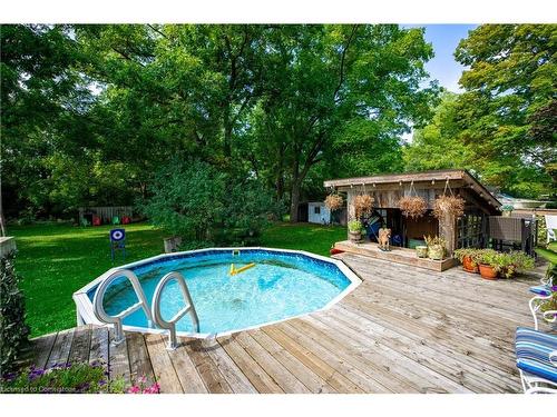 44 Sims Lock Road, Caledonia, ON - Outdoor With Above Ground Pool With Backyard