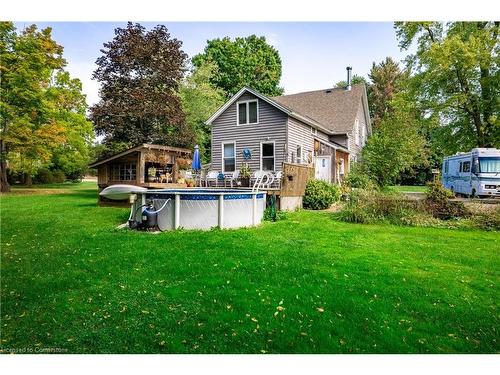 44 Sims Lock Road, Caledonia, ON - Outdoor With Above Ground Pool With Backyard