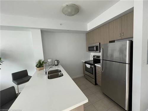 208-5020 Corporate Drive, Burlington, ON - Indoor Photo Showing Kitchen With Stainless Steel Kitchen With Double Sink