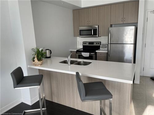 208-5020 Corporate Drive, Burlington, ON - Indoor Photo Showing Kitchen With Stainless Steel Kitchen With Double Sink