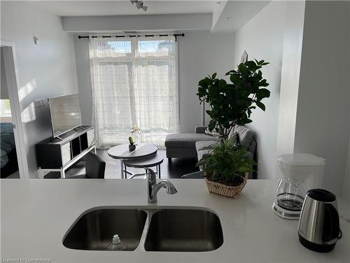 208-5020 Corporate Drive, Burlington, ON - Indoor Photo Showing Kitchen With Double Sink