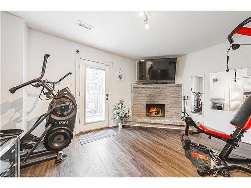 26-1155 Paramount Drive, Stoney Creek, ON - Indoor With Fireplace