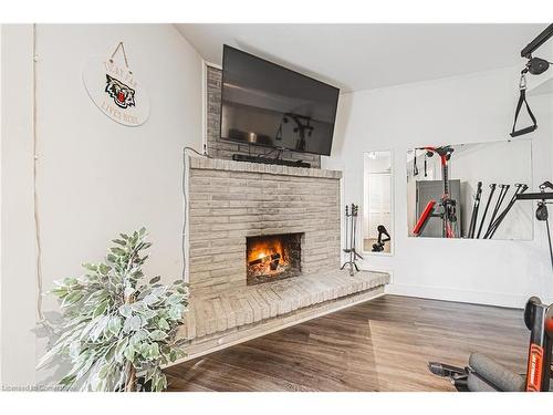 26-1155 Paramount Drive, Stoney Creek, ON - Indoor Photo Showing Living Room With Fireplace