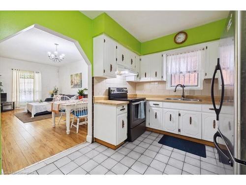 63 Clyde Street, Hamilton, ON - Indoor Photo Showing Kitchen With Double Sink