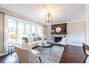 228 Plumtree Drive, Burlington, ON  - Indoor Photo Showing Living Room With Fireplace 