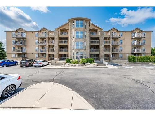 310-1800 Walkers Line, Burlington, ON - Outdoor With Balcony With Facade