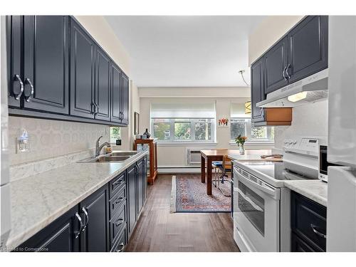 1-245 Bay Street S, Hamilton, ON - Indoor Photo Showing Kitchen With Double Sink